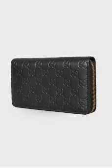 Leather wallet in signature print