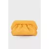 Draped leather clutch