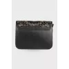 Perforated leather bag