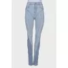 Light blue jeans with raised seams