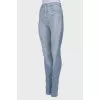 Light blue jeans with raised seams