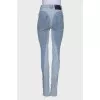Light blue jeans with raised seams