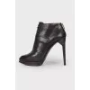 High-heeled leather ankle boots
