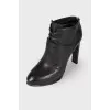 High-heeled leather ankle boots