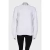 Knitted white sweater