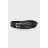 Black embossed belt