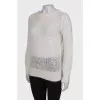 White knitted sweater