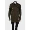 Dark green jacket with patches