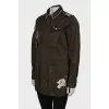 Dark green jacket with patches