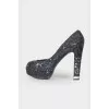 Black shoes decorated with sequins