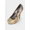 Gold embossed shoes