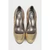 Gold embossed shoes