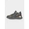 Black sneakers with golden rhinestones