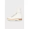 White boots with a knitted part