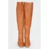 Low-heeled leather over the knee boots