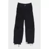 Black jeans with decorative stitching
