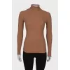 Brown golf with tag