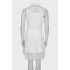 White dress with buttons and tag