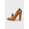 Patent brown shoes