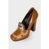Patent brown shoes