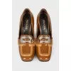 Patent brown shoes