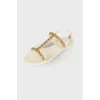 Sandals with gold-tone hardware