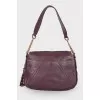 Purple bag with gold hardware