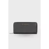 Black wallet with gold hardware