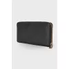 Black wallet with gold hardware