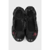 Black leather ballerina shoes