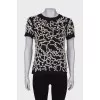 Black T-shirt decorated with pearls