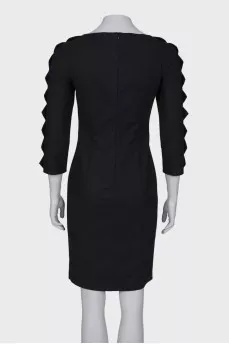 Black dress with decorated sleeves