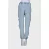 Ripped-effect elasticated jeans