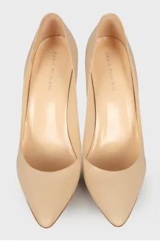 Beige leather pumps