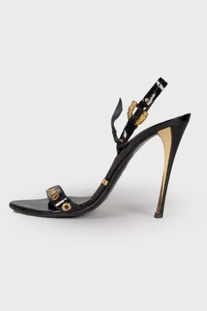 Lacquered sandals with golden hardware