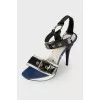 Leather sandals with decorative buckle