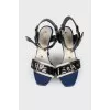 Leather sandals with decorative buckle