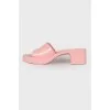 Rubber pink mules