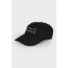 Black cap with an inscription