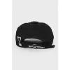 Black cap with an inscription