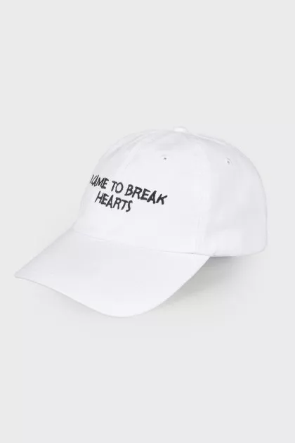 White cap with an inscription