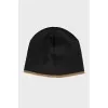 Black hat with golden lettering