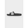 Black slippers with brand logo