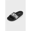 Black slippers with brand logo