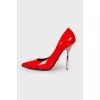 Red leather pumps