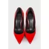 Red leather pumps