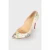 Pumps with snakeskin effect print