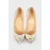 Pumps with snakeskin effect print