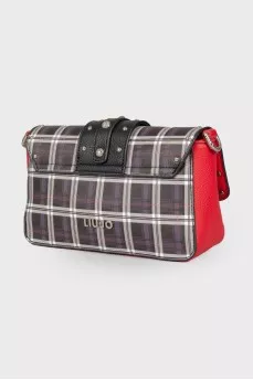 Bag in a cage with a wide strap