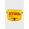 Yellow bag with textile strap